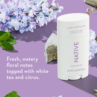 Native deodorant with text saying "Fresh, watery floral notes topped with white tea and citrus", styled with bouquets of lilacs