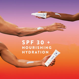 Hands holding tubes of Native Mineral Suncare Daily Body and Face Sunscreen SPF 30 with swatches on arms