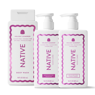 Three white Native Hair Care bath and body products on a white background: a 16.5 fl oz body wash bottle, a 16.