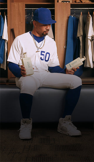 Mookie holding native Products on both hands