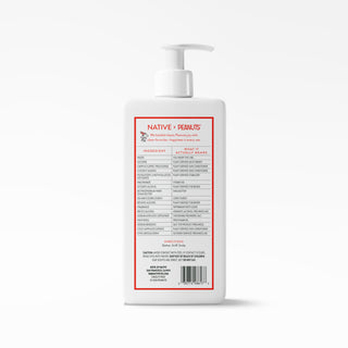 A white pump bottle of Native + Peanuts Moisturizing Lotion shown from the back, featuring a white label with red borders and black text, on a clean white background.