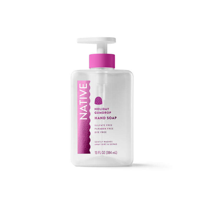 A 13 fl oz bottle of Native Holiday Gumdrop Hand Soap on a clean white background. The bottle is frosted white with a bright pink pump dispenser and a matching pink label featuring a purple gummy bear graphic.