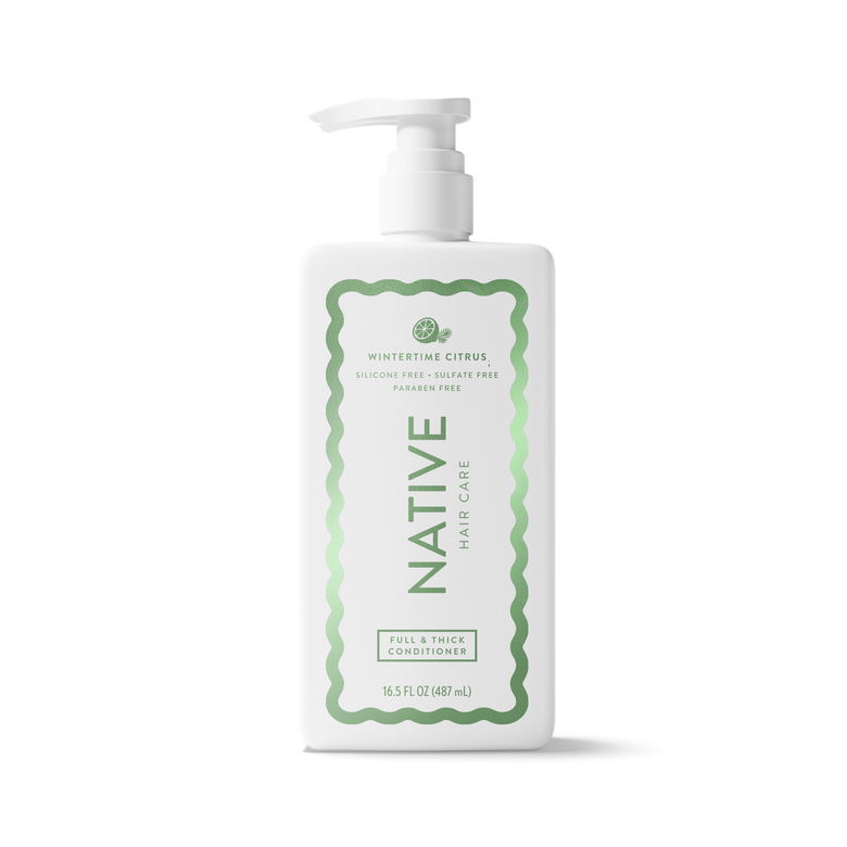 A 16.5 fl oz white plastic pump bottle of Native Hair Care Winterbreeze Citrus Full & Thick Conditioner, featuring a white label with green wavy borders and text, set against a plain white background.