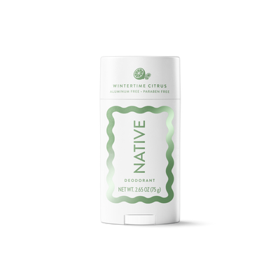 A white Native brand deodorant stick in Wintertine Citrus, featuring a white container with a light green wavy border and text, set against a plain white background.