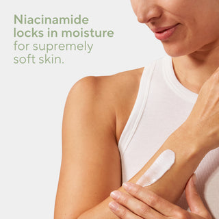Niacinamide locks in moisture for supremely soft skin, with woman applying cream.