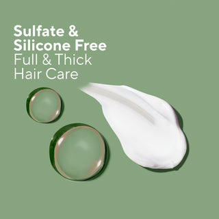A green promotional graphic with the text 'Sulfate & Silicone Free Full & Thick Hair Care' above two glossy droplets and a white cream smear on a muted green background.