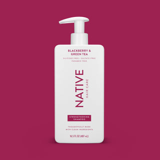 Front of Blackberry & Green Tea Strengthening Shampoo bottle on carmine background