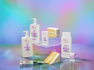 Collection of Native brand products on a reflective surface with a colorful gradient background